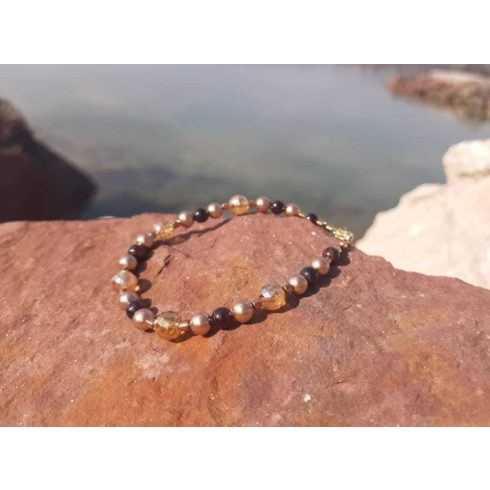 Bőség- elegancia karkötő, Swarovski gyöngyök, Arany Aurakvarc, Gránát, Hematit kristályokból.